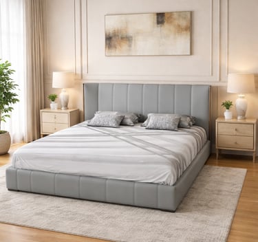Modern grey leather tufted bed frame with matching nightstands and elegant bedroom decor.