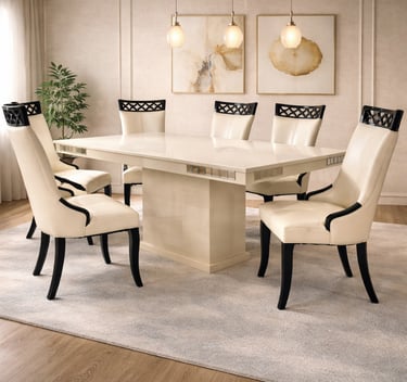 Modern cream marble dining table set with six elegant leather chairs in a luxury home interior.