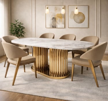 Luxury dining room featuring an oval marble dining table with a gold fluted base and velvet chairs.