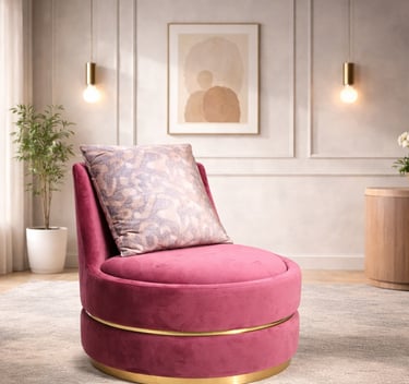 Modern pink velvet swivel accent chair with gold base in a luxury living room setting.