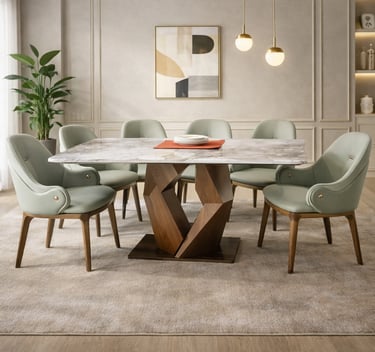 Modern marble dining table with sculptural wood base and sage green upholstered chairs in a luxury room.