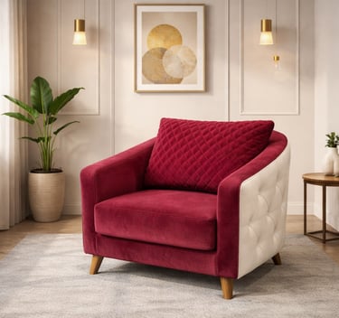 Modern red velvet armchair with white tufted sides in a stylish living room setting.