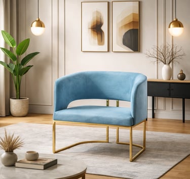 Modern blue velvet armchair with gold metal legs in a minimalist luxury living room.