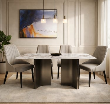 Modern marble dining table with four grey leather chairs and elegant pendant lights.