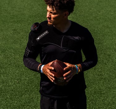 Patrick Mahomes with Venom shoulder heat massager treatment