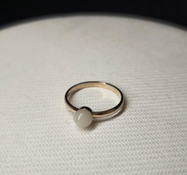 anillo oro blanco con leche materna