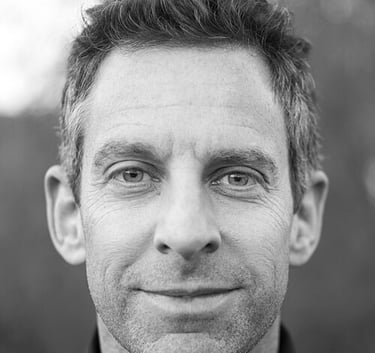 Sam Harris with a tie on a black and white photo