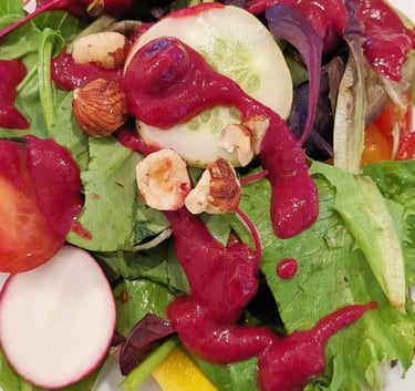 Rainbow salad with heirloom cherry tomato & superfood berry dressing. Gluten-free dairy-free dinner