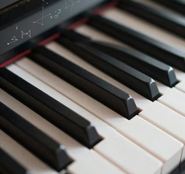 Close-up of a piano keyboard where the light hits the keys softly, with a subtle overlay of abstract mathematical symbols representing the PhD background, using tones of #527A79 and #F5F7F8.