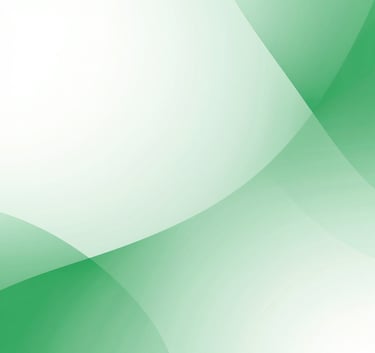 a man riding a skateboard down a street next to tall buildings