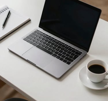 A top-down view of a workstation with a premium ultrabook, a notebook, and a coffee cup, Southern European professional home office environment, clean lines.