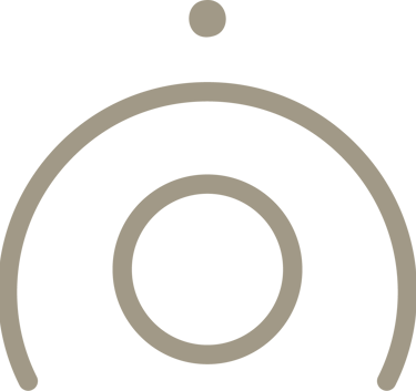 Minimalist geometric symbol with a circle inside a semicircular arch and a dot above it.