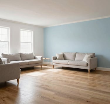 A wide-angle shot of a pristine, sun-drenched North American living room with hardwood floors and minimalist furniture, emphasizing a spotless and welcoming atmosphere, soft white and pale blue color palette.