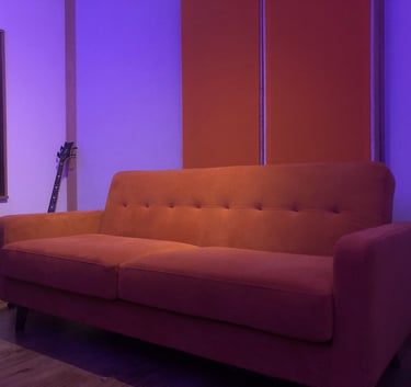 Orange sofa in Vox Music Recording Studio in Manchester