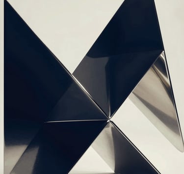 A minimalist and professional abstract representation of connectivity, featuring polished silver geometric shapes reflecting a dark blue and off-white environment, high-end studio lighting.
