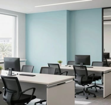 A modern and bright South American corporate office space with minimalist furniture and pale mist blue decorative elements, showing a clean professional atmosphere.