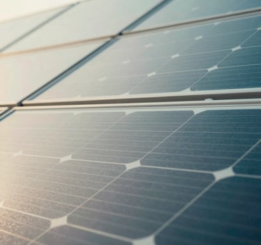 A close-up, artistic shot of a high-tech solar panel surface reflecting a clear morning sky. The composition is geometric and modern, featuring the cool tones of #8EC1BA and #2D6F7C. The lighting is crisp and clean, symbolizing transparency and efficiency.