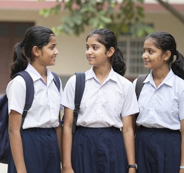 two men and four women meeting in office