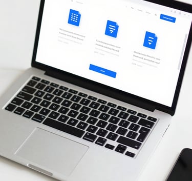 A top-down view of a modern laptop on a clean white desk. The screen displays the editmypdf24.com dashboard with intuitive icons for merging and splitting documents in #214E87 blue colors.