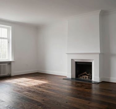 A wide-angle shot of a renovated Dutch living room, featuring clean white walls, a dark oak floor, and a minimalist fireplace, soft morning light.