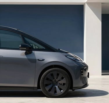 A sleek, modern vehicle parked in a bright, minimalist architectural space with muted navy blue shadows and clean lines, emphasizing value and quality.