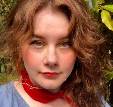 Ellie Benson Digital Consultant Female Image Profile Red Hair Woman Freckles Red bandana hazel eyes