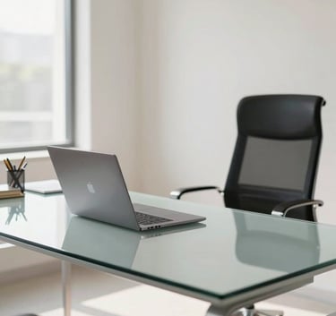 A high-end, bright office interior in Ahmedabad, featuring a sleek glass desk with a high-performance laptop and professional South Asian workspace aesthetics. Daylight fills the room, casting soft off white light.