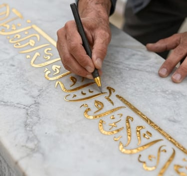 A professional photograph of a master craftsman in Istanbul carefully restoring the gold leaf calligraphy on a clean white marble gravestone, focus on the hand and the tool, elegant and respectful lighting.