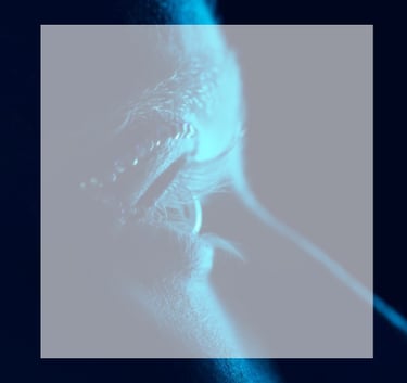 a person with a blue eye and a white background