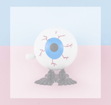 Dry Eye a toy eyeball with feet and red lines on eye