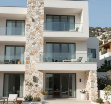 Exterior of a luxury modern villa in Datça with stone walls and glass balconies, bright Mediterranean sunlight, high contrast with #F5F7F8 and #5B6A7A tones.