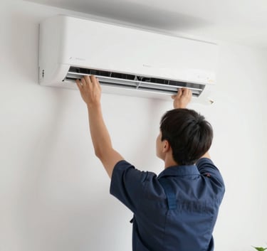 A high-end, modern indoor split AC unit being mounted on a pristine white wall by a professional expert. The setting is a clean, contemporary living room. Soft, natural lighting. The technician's tools are professional and well-organized, featuring #4F6D7A accents.