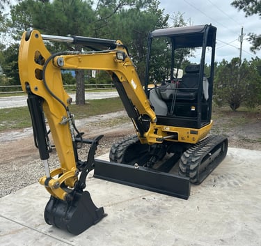Excavation equipment clearing land in Holly Ridge NC