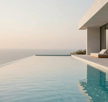 A luxury modern swimming pool with crystal clear water reflecting a #F2F9F9 sky. Minimalist design with high-quality surroundings, embodying prestige and reliability.