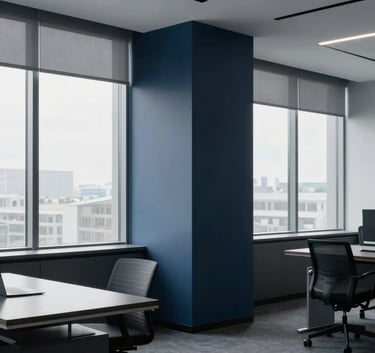 A minimalist and contemporary North American professional office interior, featuring clean lines, large windows with soft natural light, and a color palette of dark blue and grey. The atmosphere is sophisticated and quiet.