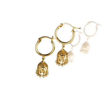 Gold jhumka hoop earrings photographed on a clean white background