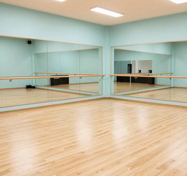 A wide, bright professional dance studio in a Spanish / Latin American city, featuring light wood floors and mirrors reflecting a sense of growth and professional efficiency, Soft Aqua accents.