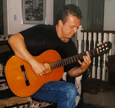 Playing for friends at a house party, 1998