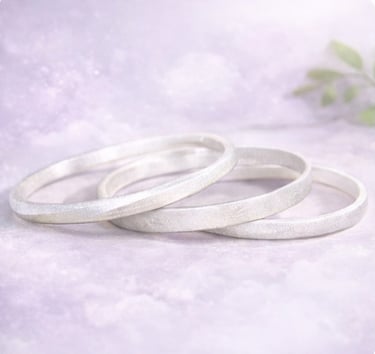 Pure silver bangles handmade by Milo and Lyra from The Artisan Lab Designs