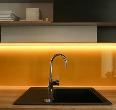 a kitchen sink with a sink and a counter top