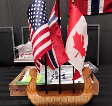 viking ship centerpiece with American, Canadian and Norwegian flags