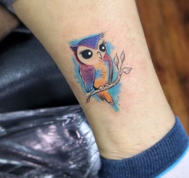 Watercolor Owl tattoo by Dudo's Tattoos Hyderabad