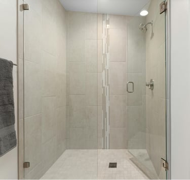 Modern frameless glass shower enclosure installed by FixShowers in an Auckland bathroom