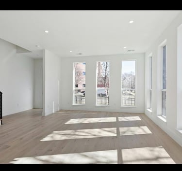 Professional post-construction cleaning service removing dust and debris from a newly renovated home