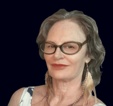 Deb Guy, embodiment mentor for high-functioning women, smiling in portrait pho