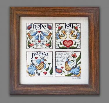 A rustic style cross-stitch frame, framed by TFG Frames Gallery in KL
