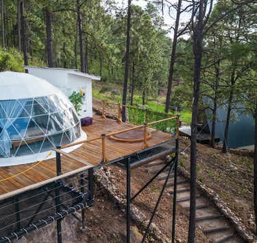 a dome shaped glass dome with a deck and a deck