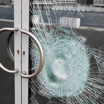 broken shop door glass