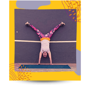 Martina in a handstand position outdoors in Lisbon.