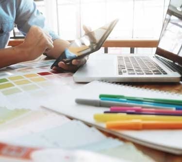 Event staff member ensuring high-quality photo booth operation